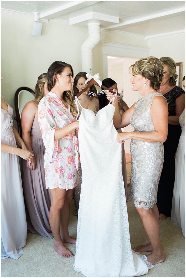 bride getting into wedding dress at Bridgewater Farm by Jessica Kay