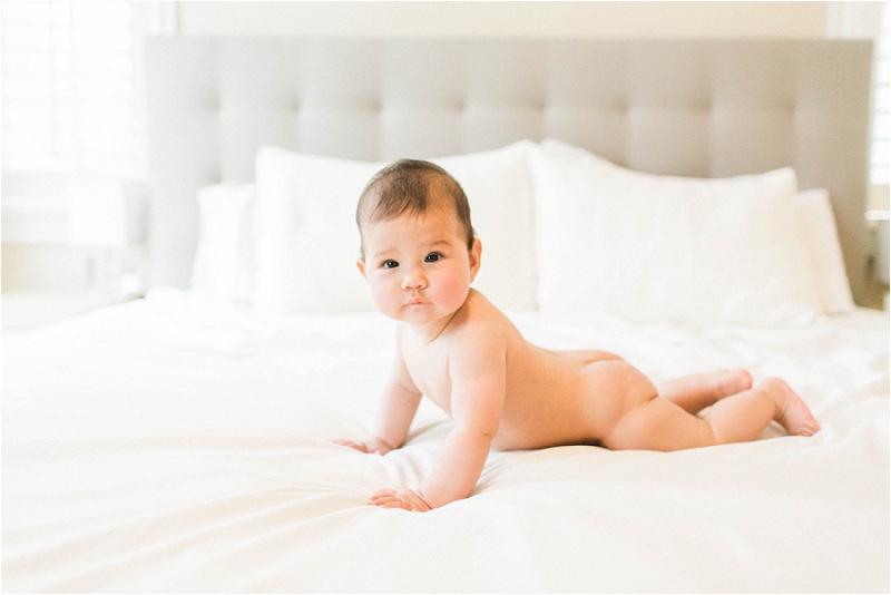 naked baby on bed