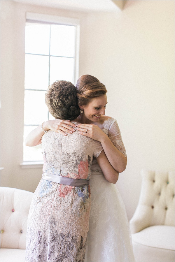 bride hugging mom