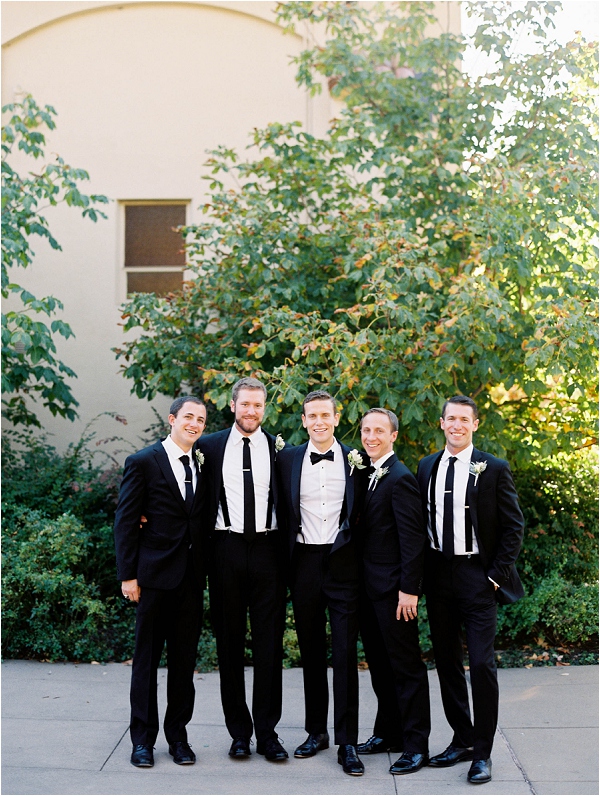 groom hanging out with groomsmen