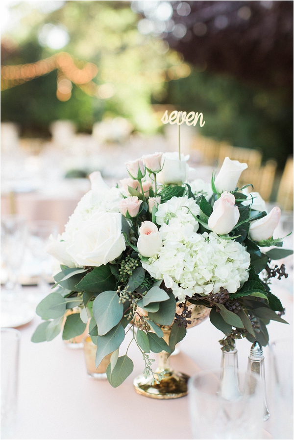 lush floral centerpiece on table