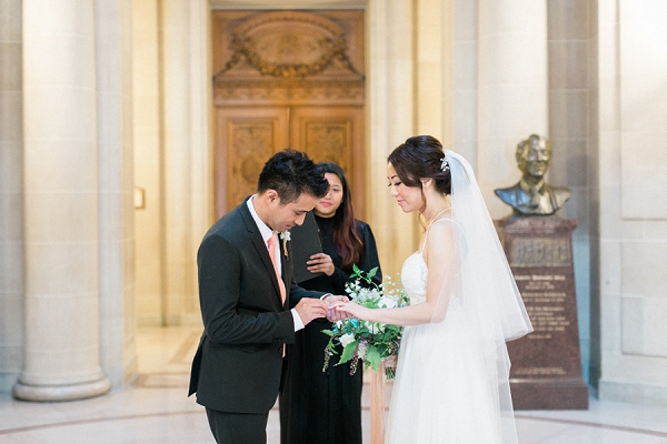 couple getting married on the fourth floor galleries in san francisco city hall
