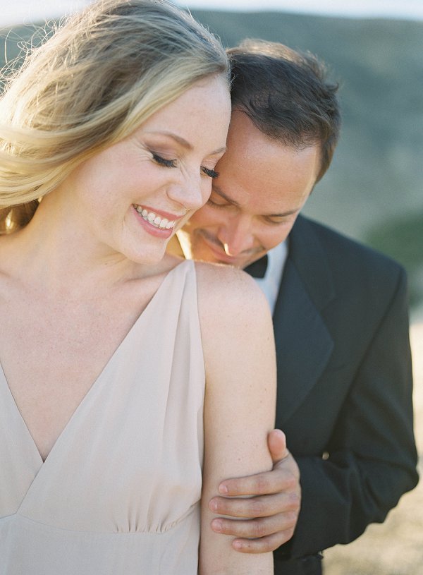 Mt Tam Engagement session. a soft embrace between man and woman.  they are smiling