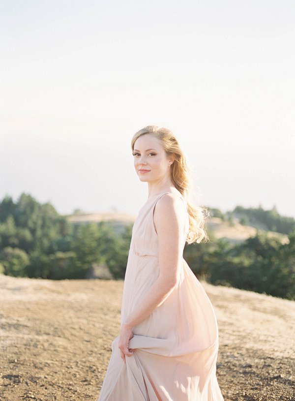 Mt Tam Engagement session. woman smiling in a flow pink dress. location near san francisco in marin county.
