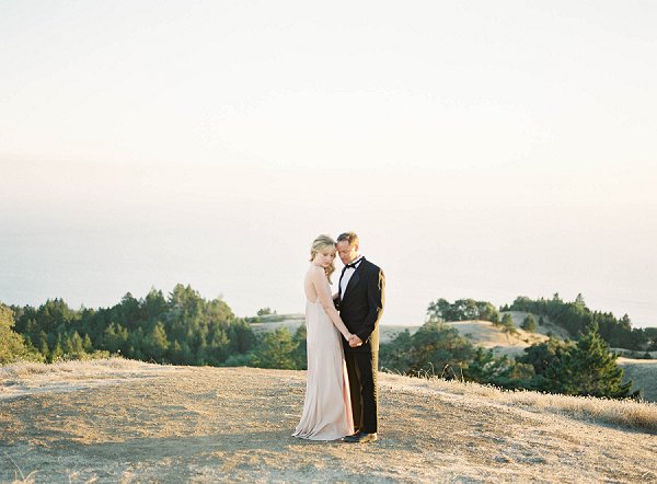 Mt Tam Engagement session. man and woman hugging on a hillside.  near san francisco in marin county.