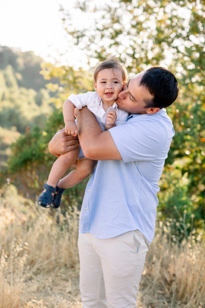 San Francisco Orinda Family Photography husband holding son upside down