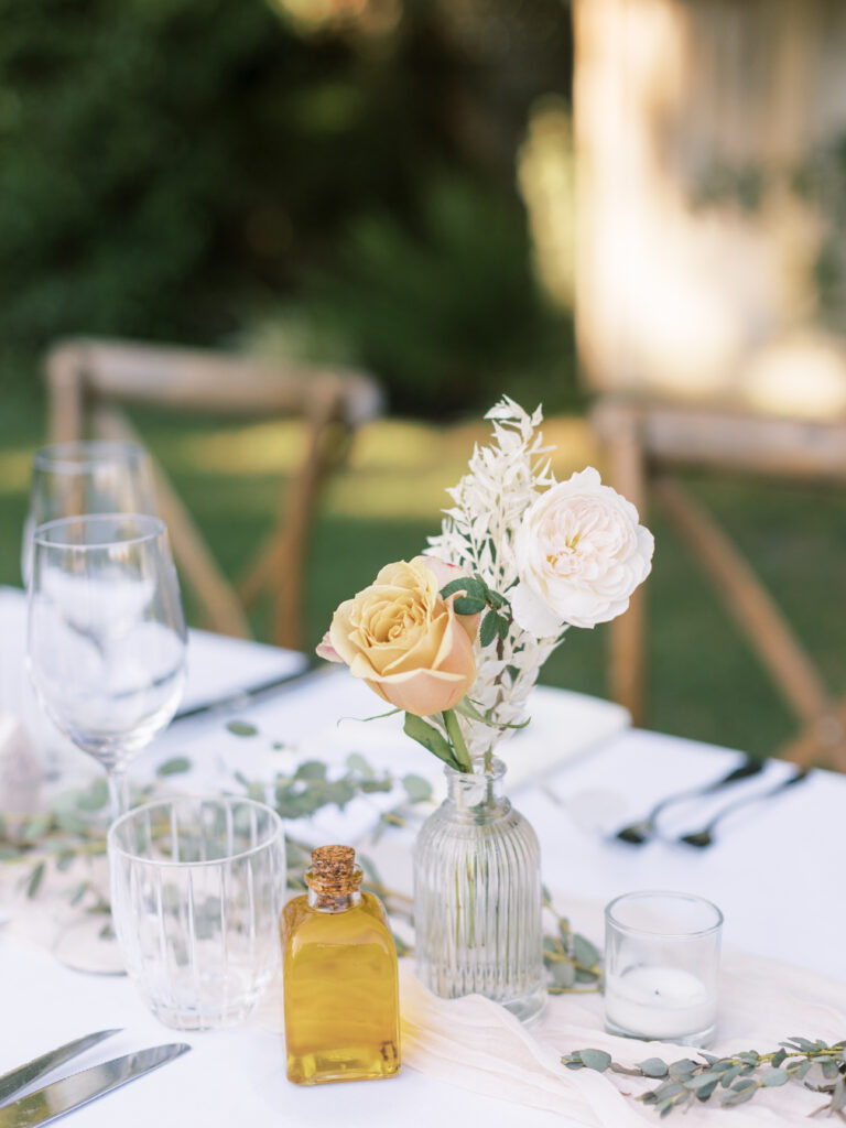 bouquet on the table at reception. Tres Posti Napa Valley Wedding
