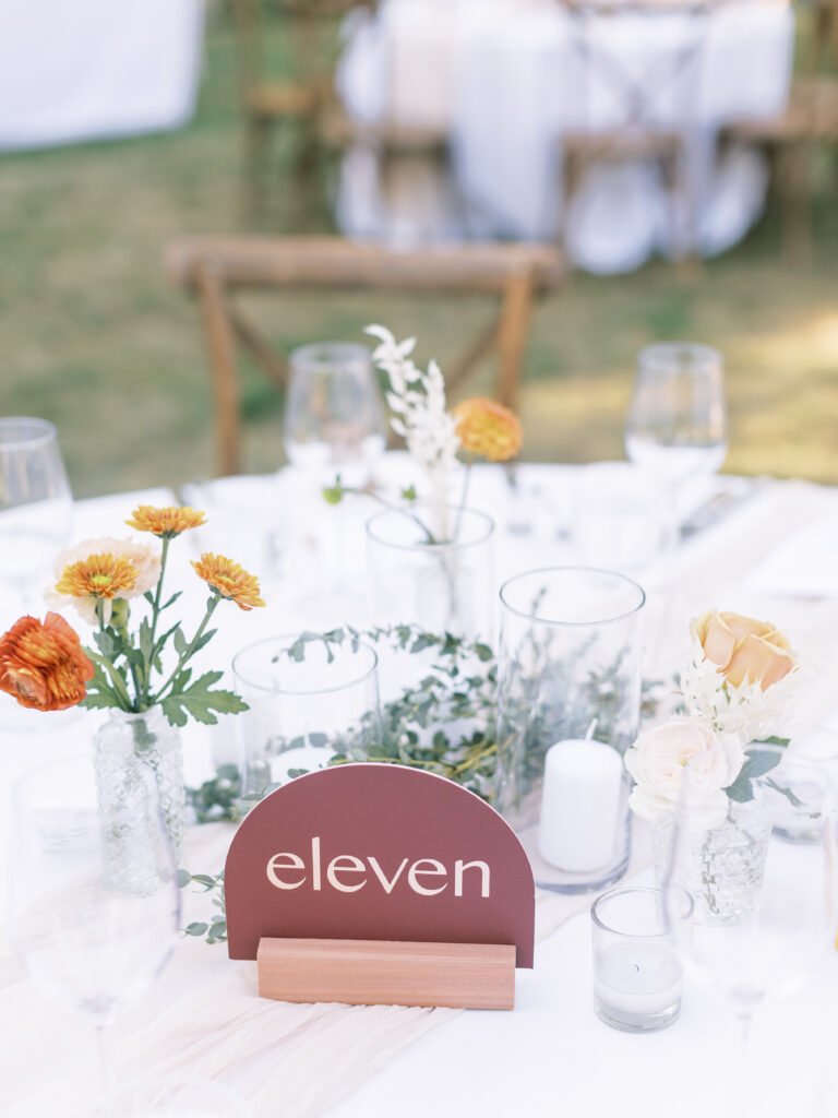 Table numbers and bouquets.  Tres Posti Napa Valley Wedding