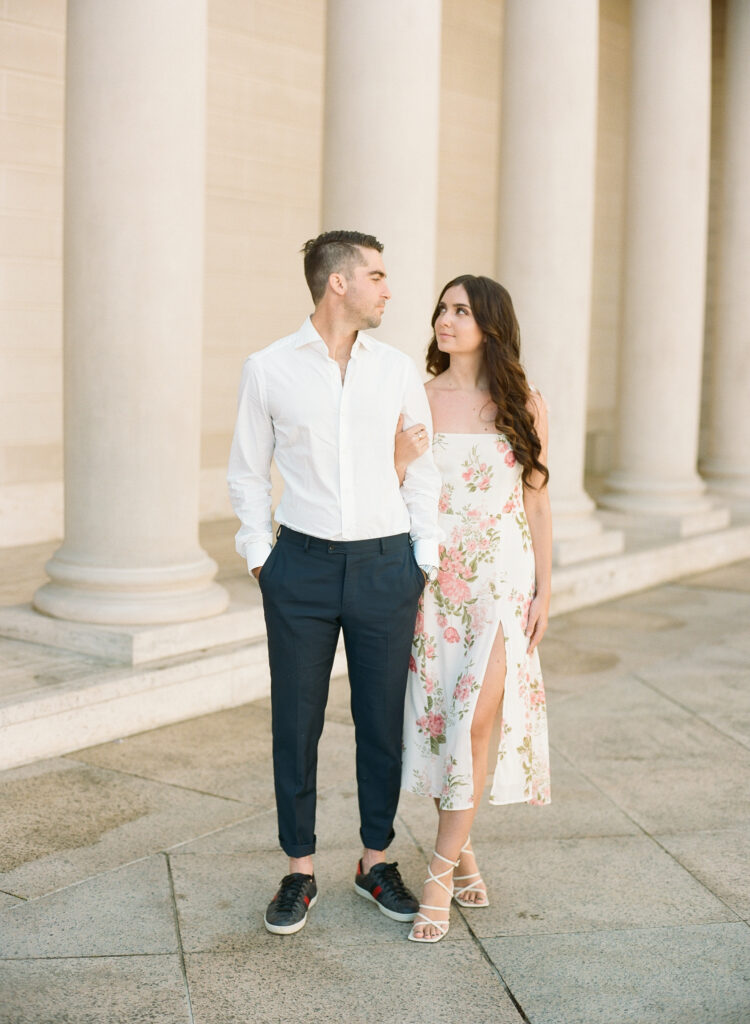couple walking together for their engagement session at the Legion of Honor